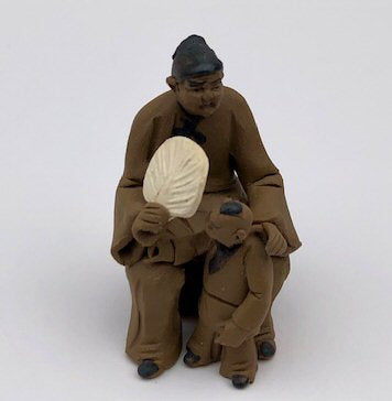 Ceramaic Figurine -Mom & Son Sitting On A Bench - 2.25