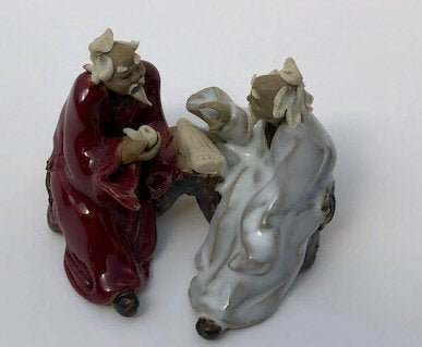 Ceramic Figurine-Two Men Sitting On A Bench - 2.25-Holding a Pipe-Color: Red & White