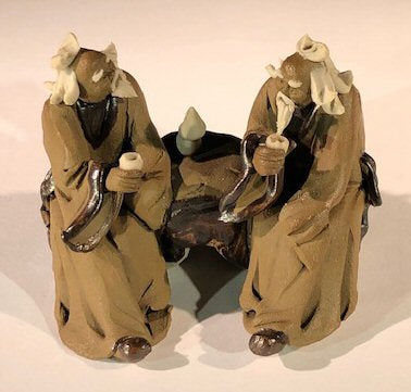 Ceramic Figurine - Two Mud Men Sitting On A Bench Drinking Tea - 2.0"