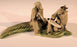 Miniature Ceramic Figurine -Two Mud Men On A Leaf, One Sitting Holding a Fan, The Other Sitting With Musical Instrument- 2