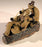 Miniature Ceramic Figurine-Mud Man & Women on Log Smoking a Pipe - 2.5