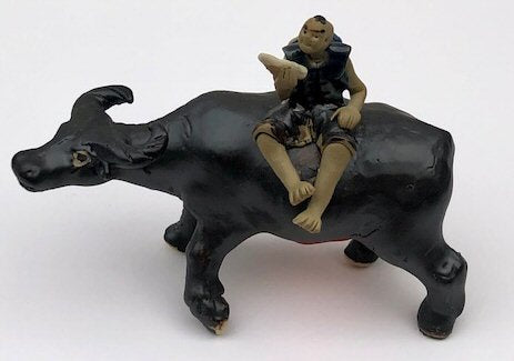 Ceramic Figurine-Boy Sitting On Standing Buffalo- Large - 3.5