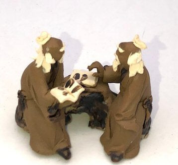 Miniature Ceramic Figurine-Two Mud Men Sitting On A Bench Reading Books - 1.5-