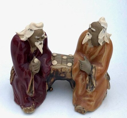 Ceramic Figurine-Two Men Sitting On A Bench Playing Chess - 2-Color: Orange & Red