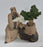 Ceramic Figurine: Mud Man Sitting with Fan & Bonsai Tree