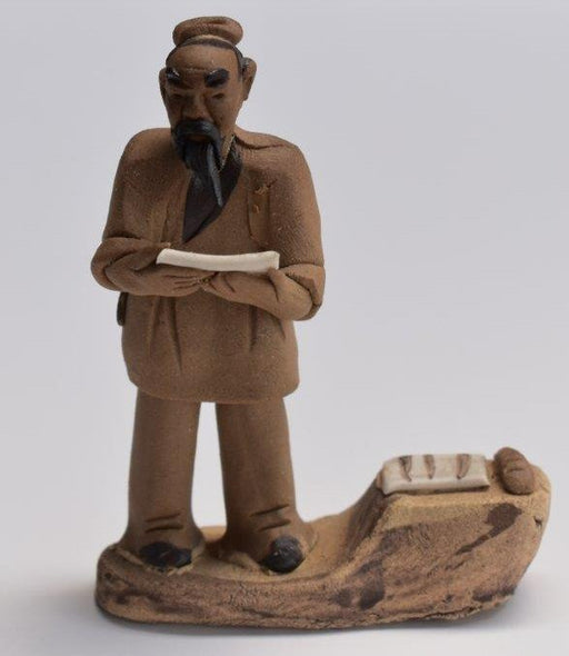 Miniature Ceramic Figurine - Mud Man Reading