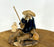 Miniature Ceramic Glazed Fisherman Figurine-Sitting On A Log -Blue - 2.5