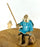 Miniature Ceramic Glazed Fisherman Figurine-Sitting On A Log -Light Blue - 2.5